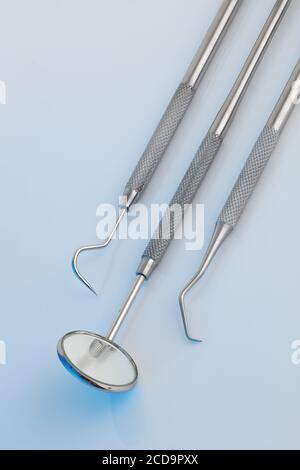 Dental tools in a clinical blue light Stock Photo