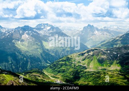 Alps Mountains. Alpine Austria Mountain With Clouds