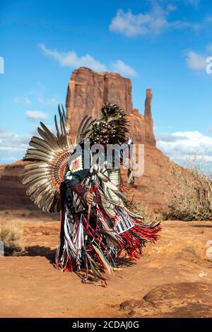 Navajo Dancer, West Mitten Butte in background, Monument Valley, Arizona and Utah border USA Stock Photo