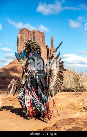 Navajo Dancer, West Mitten Butte in background, Monument Valley, Arizona and Utah border USA Stock Photo