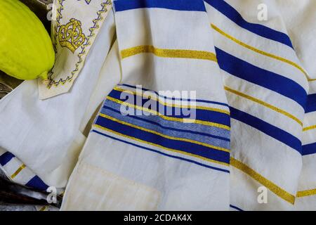 Traditional symbols Jewish festival of Sukkot with tallit Jewish ritual Stock Photo