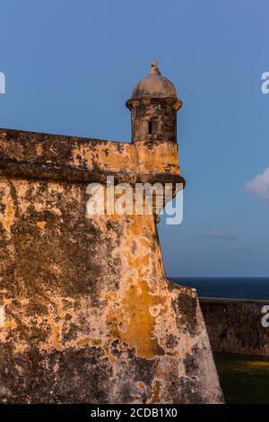 A bartizan, or guerite or sentry box on the wall of Castillo San Felipe del Morro in Old San Juan, Puerto Rico, at evening twilight.  National Registe Stock Photo