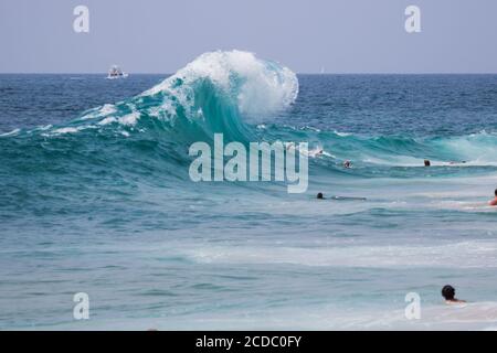Wave breaking on the beach at cylinders Newport Beach California USA Stock Photo