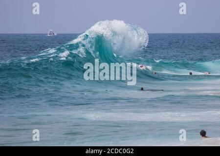 Wave breaking on the beach at cylinders Newport Beach California USA Stock Photo