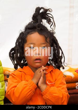 A little Khampa girl with her natural dreadlocks hair style. Stock Photo