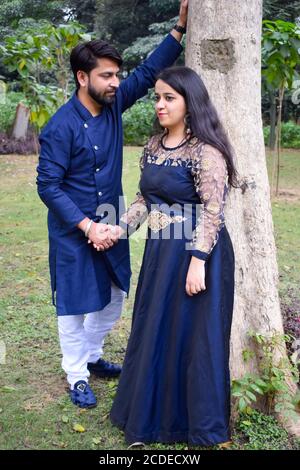 New Delhi India – November 25 2019 : A couple pose for Pre Wedding shoot inside Lodhi Garden Delhi, a popular tourist landmark in New Delhi India, for Stock Photo