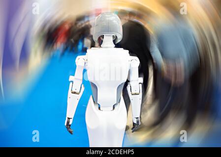 Information robot on a blurred background exhibition Stock Photo