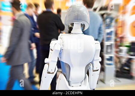Information robot on a blurred background exhibition Stock Photo