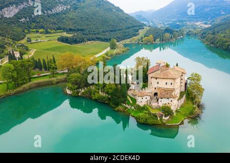 Calavino, Italy - October 09, 2019: Toblino castle on a beautiful lake. Stock Photo