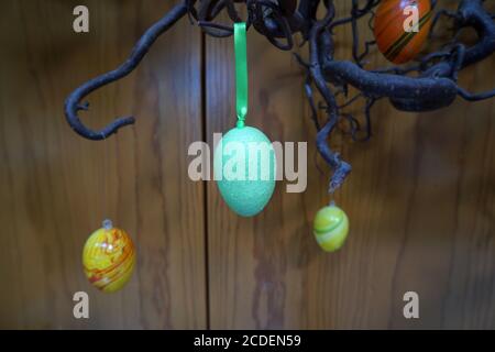 Colourful easter eggs hanging from the tree Stock Photo