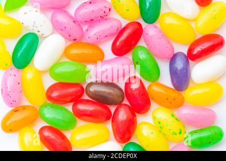 Colorful candies on a white background as colored background Stock Photo