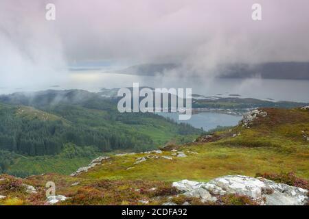 Elevated View of Loch Carron and Plockton with low cloud, taken from Plockton Crags, West Highlands, Scotland, UK. Stock Photo
