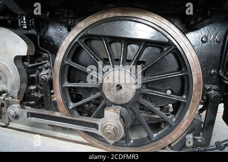 Steam Engine Axel Closeup shot for the steam locomotive, the wheel and the axle and ...