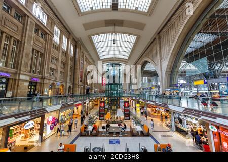 Leipzig, Germany - August 19, 2020: Leipzig main railway station Hauptbahnhof Hbf Deutsche Bahn DB hall shops in Germany. Stock Photo
