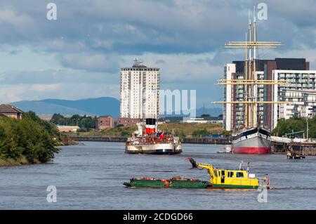 Glasgow, Scotland, UK. 28th August, 2020. The Waverley, the world's last sea going paddle steamer sets sail down the River Clyde on its return to service. Credit: Skully/Alamy Live News Stock Photo