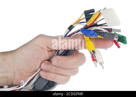 Hand holds set of cables with connectors Stock Photo