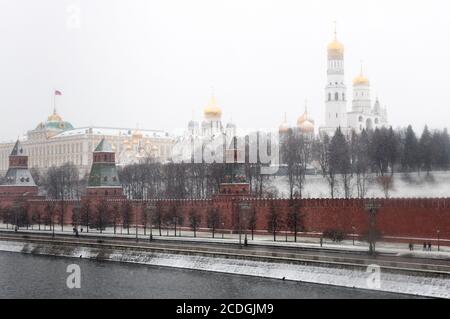 A view towards the Moscow Kremlin in winter, including (from left to right) Grand Kremlin Palace, The Cathedral of the Annunciation, The Cathedral of Stock Photo