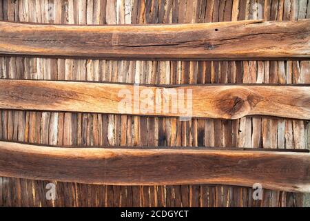 Three large wooden beams supporting the upper floor of an ancient gate house in Germany as seem from street level. Stock Photo