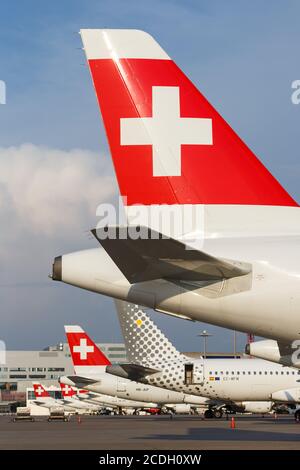 Zurich, Switzerland - July 22, 2020: Swiss Airbus airplane tails at Zurich Airport in Switzerland. Stock Photo