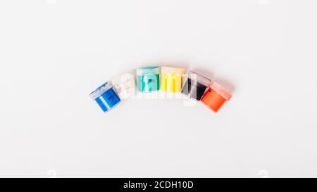 Group of multi-colored paints jars top view Stock Photo
