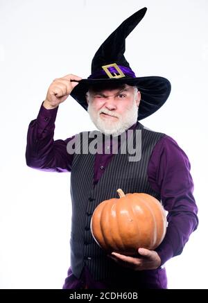Magic concept. Experienced and wise. Magic spell. Halloween tradition. Cosplay outfit. Senior man white beard celebrate Halloween. Wizard costume hat Halloween party. Magician witcher old man. Stock Photo
