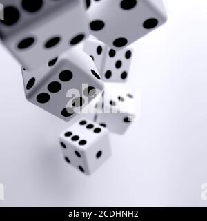 white dice cubes on a light background Stock Photo