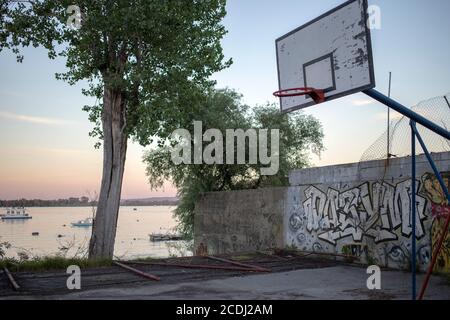 Belgrade, Serbia, Aug 27, 2020 Worn out basketball court located on the Danube River waterfront in Zemun Stock Photo