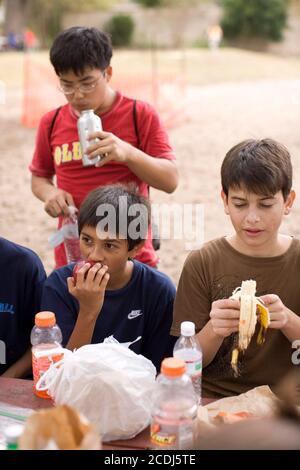 Austin, TX November 18, 2007: Eighth grade students have lunch during a school field trip to the Barton Creek greenbelt after a 4-mile walk through an urban wilderness that finishes at Barton Springs and Zilker Park. ©Bob Daemmrich Stock Photo