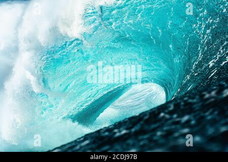 Powerful blue wave breaking in the atlantic ocean Stock Photo