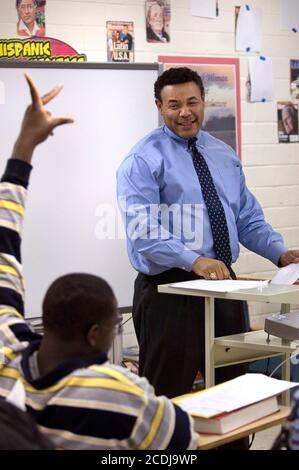 Houston, Texas USA, May 17, 2007: Black male world history teacher reviewing for a final exam with students at Jesse Jones High  School, a traditional inner-city high school with 50-50 mix of African-American and Hispanic students. ©Bob Daemmrich Stock Photo