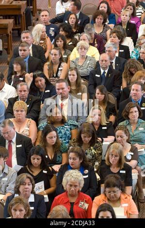 Austin, TX USA, May 24, 2007: Relatives of Texas soldiers killed in the wars in Afghanistan and Iraq listen to remarks by state officials during memorial services at the Texas Capitol. About 300 soldiers with Texas ties have died in the wars. ©Bob Daemmrich Stock Photo