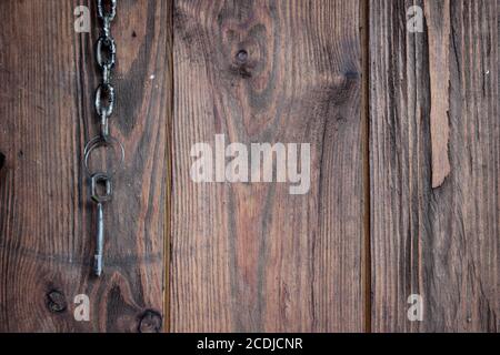 old keys hanging on a wooden wall. Secret or mystery concept. Business concept Stock Photo