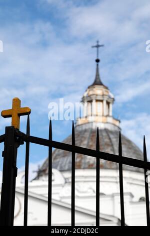 Cross on the gate of the St. Peter's Church in Daugavpils, Latvia. The Roman Catholic place of worship is in the centre of Latvia's second city. Stock Photo