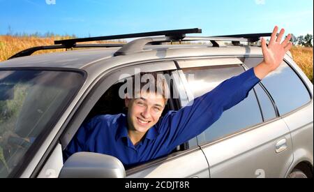 young man in a car Stock Photo