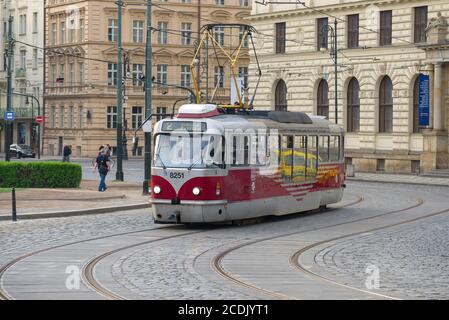 PRAGUE, CZECH REPUBLIC - APRIL 23, 2018: Tram on a city street in April morning