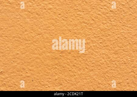 Empty orange cement wall background and texture. Beautiful Orange Advertising Backdrop. Stock Photo