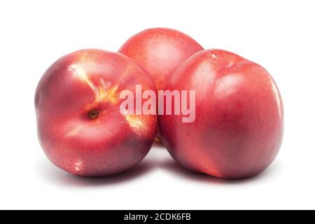 three ripe nectarines isolated on white background Stock Photo