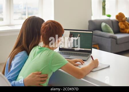 Online learning. Remote education. Home schooling. Social distance. Stock Photo