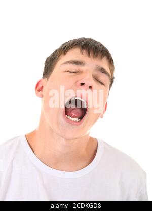 Young Man Yawning Stock Photo