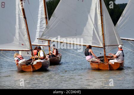 vintage norfolk class dinghies racing on river waveney at beccles suffolk england Stock Photo