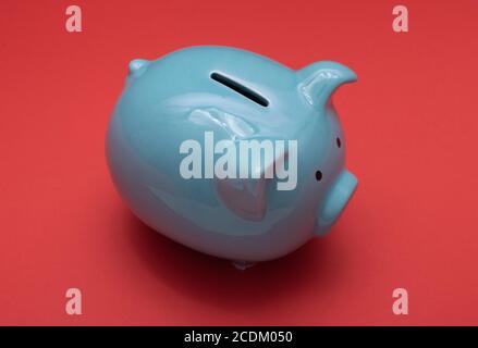 Blue piggy bank or money box Stock Photo
