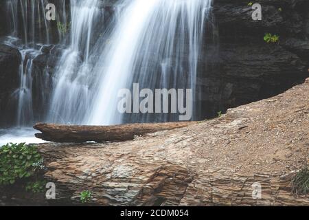 fresh water flows down dark rock at Alamere Falls in Point Reyes, California. Stock Photo