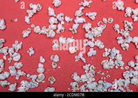 Popcorn on a red background Stock Photo