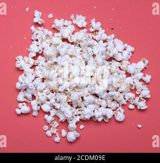Popcorn on a red background Stock Photo