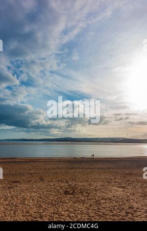 The sun sets at Exmouth Beach in South Devon, UK. Stock Photo