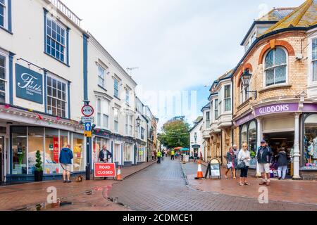 Sidmouth town centre in Devon, UK on a wet day at the end of summer. Stock Photo