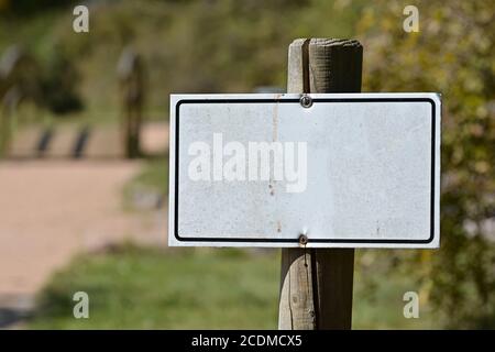 Unmark Sign Blank white unmarked sign with text space on a fence Stock Photo - Alamy