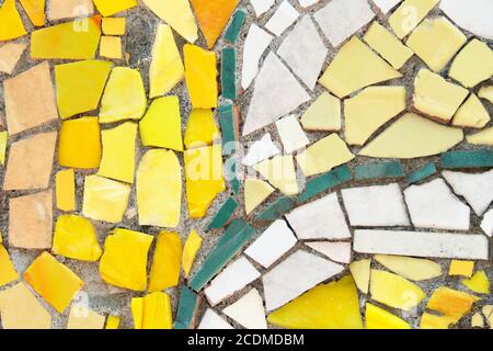 Tile crumb as a yellow mosaic texture. Stock Photo