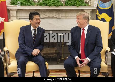Washington, United States Of America. 26th Apr, 2019. President Donald J. Trump meets with Japanese Prime Minister Shinzo Abe Friday, April 26, 2019, in the Oval Office of the White House. People: President Donald Trump, Japanese Prime Minister Shinzo Abe Credit: Storms Media Group/Alamy Live News Stock Photo