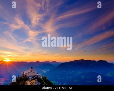 Eagle's Nest at sunset with cirrus clouds, behind Untersberg, Berchtesgaden Alps, Berchtesgaden National Park, Schoenau am Koenigssee, Upper Bavaria Stock Photo